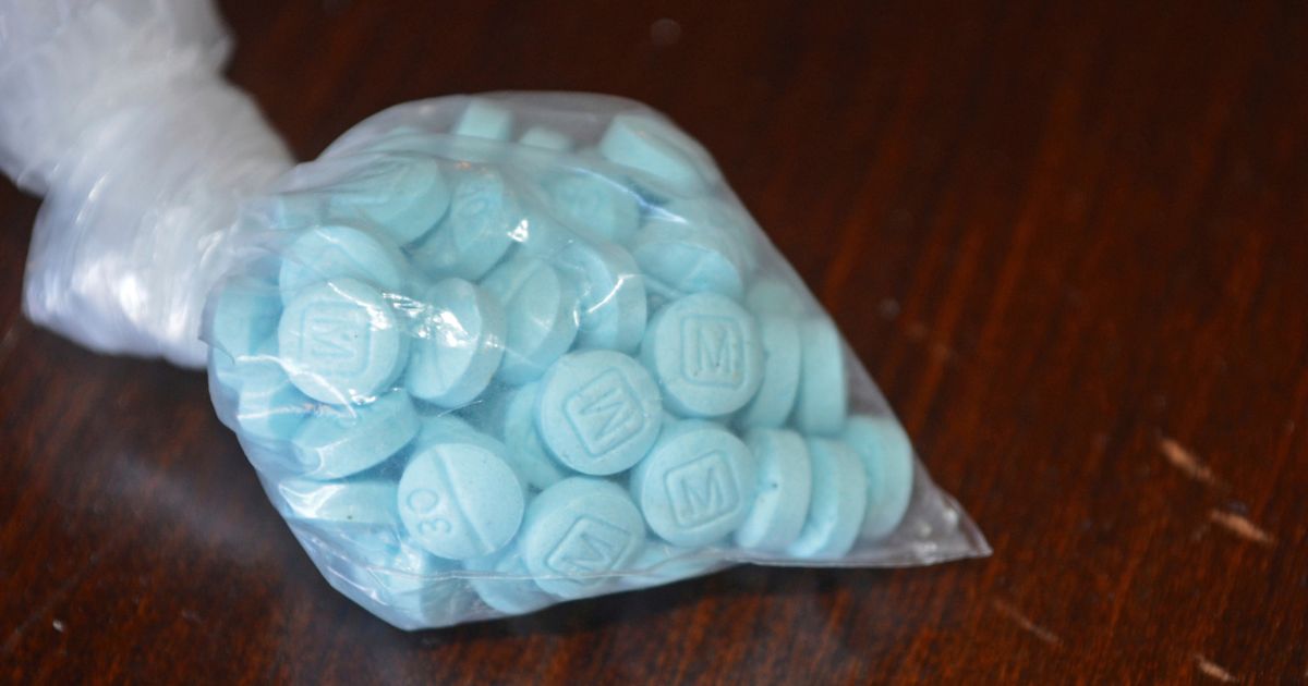 A photo provided by the U.S. Drug Enforcement Administration's Phoenix Division shows a closeup of fentanyl-laced sky blue pills in 2017.