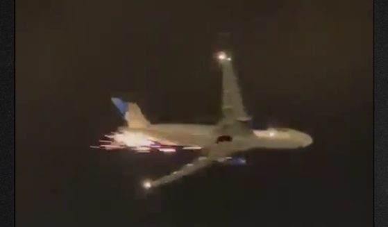 Video showed a shower of sparks coming from the plane.