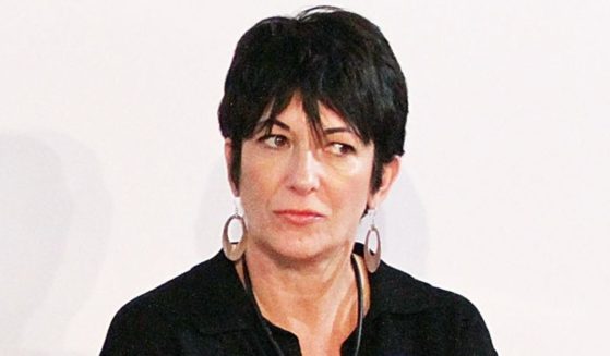 According to her attorneys, Ghislaine Maxwell -- seen at a symposium in New York City on Sept. 20, 2013 -- has failed to pay her legal fees.