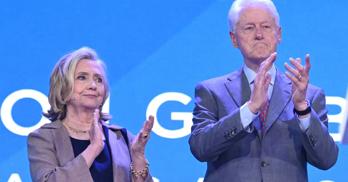 Hillary Clinton and former President Bill Clinton attend a Clinton Global Initiative meeting on Monday in New York City.