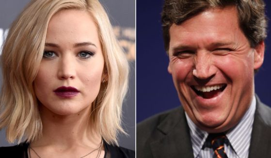 In an interview with Vogue, actress Jennifer Lawrence, left, said that she has recurring nightmares about Fox News host Tucker Carlson, right.