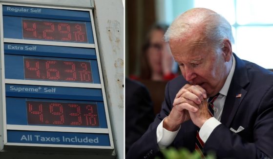 Prices are displayed at a gas station in the Brooklyn borough on Aug. 11 in New York City. President Joe Biden delivers remarks during a Cabinet meeting at the White House on Tuesday in Washington, D.C.