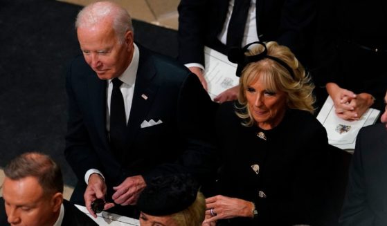 President Joe Biden and first lady Jill Biden arrive for the funeral of Queen Elizabeth II at Westminster Abbey in London on Monday.