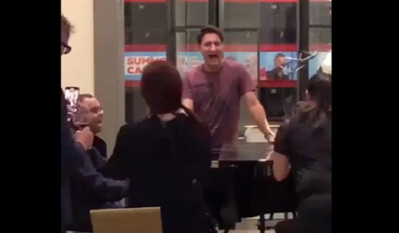 Canadian Prime Minister Justin Trudeau captured on camera singing in a London hotel lobby.
