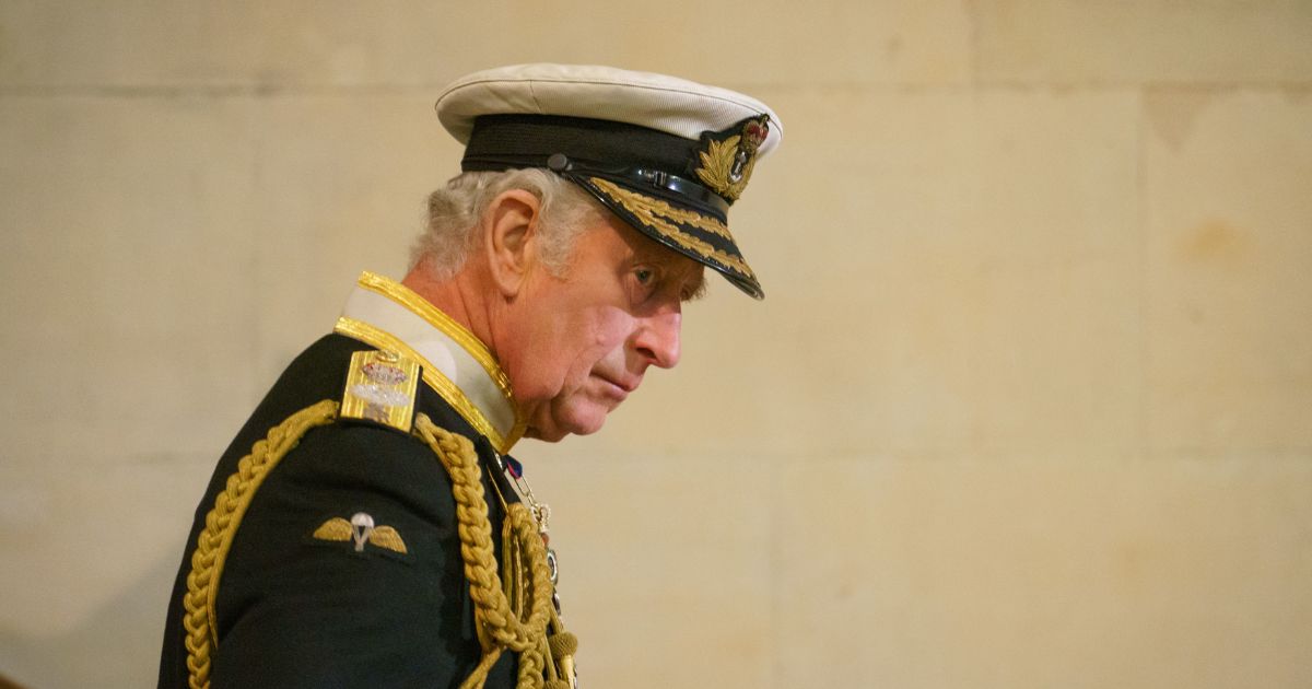 King Charles III arrives to stand vigil beside the coffin of Queen Elizabeth II as it lies in state in Westminster Hall on Friday in London.