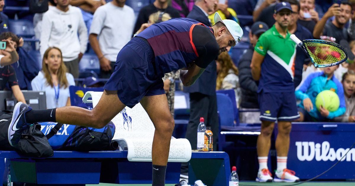 Nick Kyrgios of Australia smashes his racket after being defeated by Karen Khachanov in the quarterfinals of the U.S. Open at the Billie Jean King National Tennis Center on Wednesday in the Queens borough of New York City.