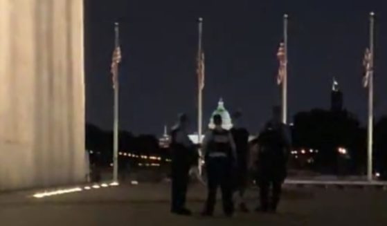Tuesday night, police detained one person suspected of vandalizing the Washington Monument in Washington, D.C., with a bizarre message in red paint.