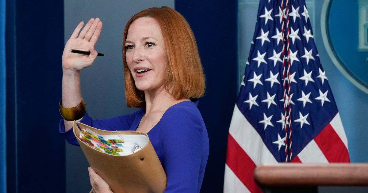 Jen Psaki waves as she leaves after giving her last daily news briefing as the White House press secretary on May 13.