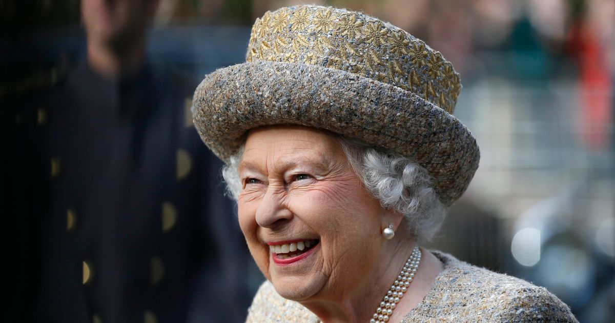 Queen Elizabeth II and her bodyguard had a good chuckle over their encounter with two Americans hiking in Scotland.