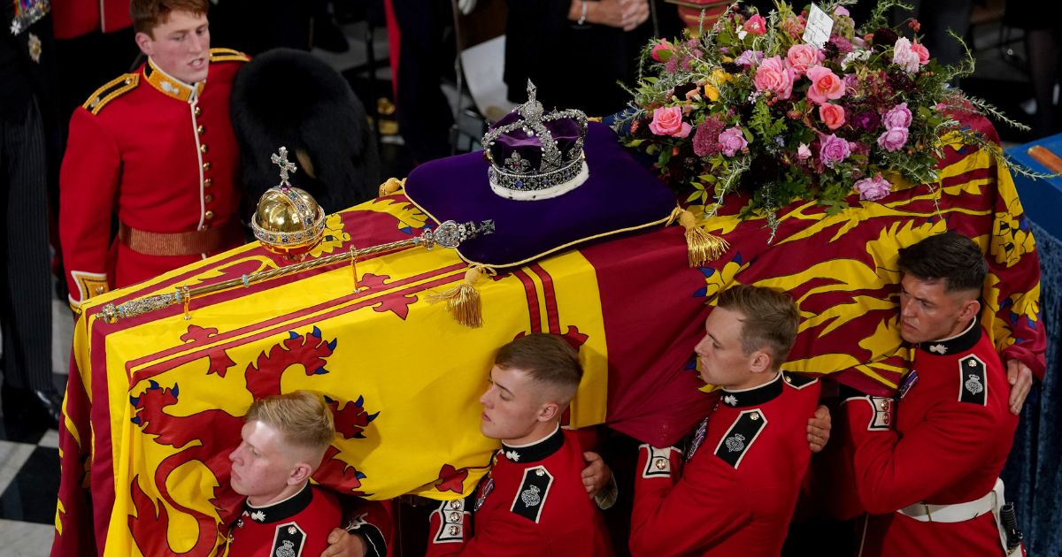 Queen Elizabeth II's coffin is pictured with the bearer party during the state funeral at Westminster Abbey in London on Monday.