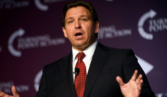 Florida Gov. Ron DeSantis, seen at an August event, said he has no plans to stop sending illegal immigrants to "sanctuary states."