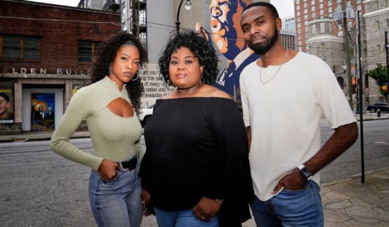 Black Lives Matter Global Network Foundation board members D'Zhane Parker, left, Cicley Gay, center, and Shalomyah Bowers, right, pose for a portrait in Atlanta, Georgia, on May 13.