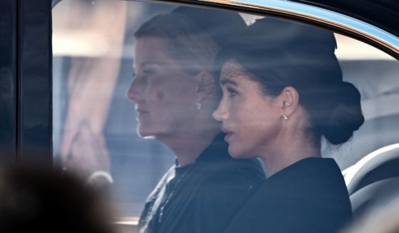 Sophie, Countess of Wessex, left, and Meghan, Duchess of Sussex are driven behind the coffin of Queen Elizabeth II during a procession from Buckingham Palace to the Palace of Westminster in London on Wednesday.