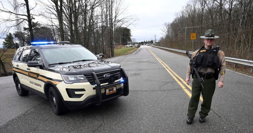 A Tennessee Highway Patrol officer blocks the road to McGhee Tyson Air National Guard Base in Alcoa, Tennessee, after reports were received of shots being fired Jan. 15, 2020.