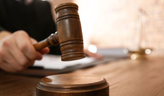 A judge holding a gavel.