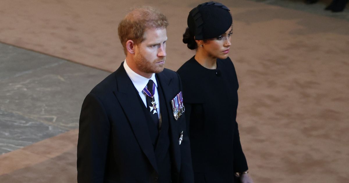 Prince Harry, Duke of Sussex, and Meghan, Duchess of Sussex are pictured as the coffin of Queen Elizabeth II is escorted into Westminster Hall on Wednesday.
