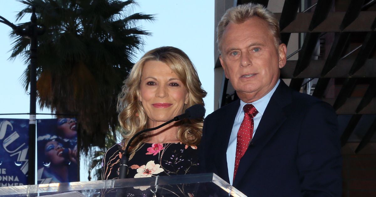 Longtime "Wheel of Fortune" host Pat Sajak is pictured in a 2019 file photo with longtime, letter-touching partner Vanna White.