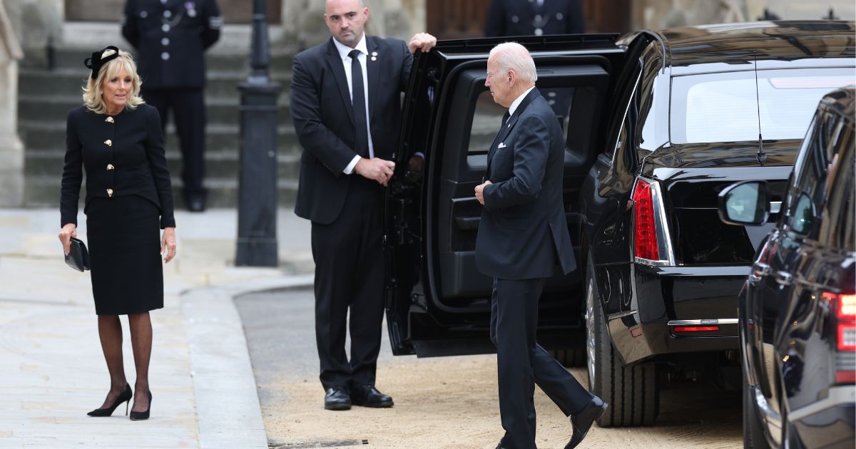 President Joe Biden and first lady Jill Biden arrive by limousine Monday at the funeral for the United Kingdom's Queen Elizabeth II.