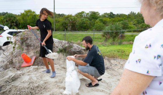 Edgewater, Florida, residents fill sandbags as the Sunshine State prepares for Hurricane Ian, which is expected to make landfall Wednesday.