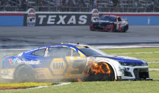 Driver Chase Elliott's tire burns after he contacted the wall during the NASCAR Cup Series race at Texas Motor Speedway in Fort Worth last Sunday.