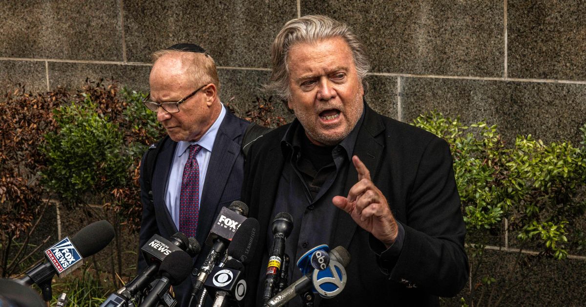 Donald Trump's former advisor Steve Bannon speaks to the press after leaving the District Attorney's office in Manhattan on Sept. 8.