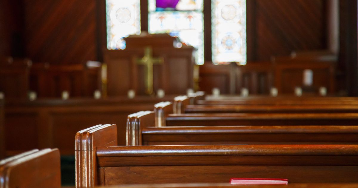 An empty church is seen in this stock image.