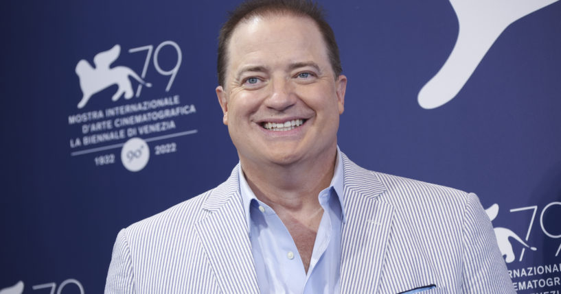 Brendan Fraser takes photos during the photo call for "The Whale," his new film debuting at the 79th edition of the Venice Film Festival in Venice, Italy on Sunday.