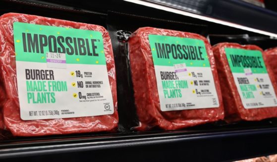 "Impossible Foods" burgers made from plant-based substitutes for meat products sit on a shelf for sale on Nov. 15, 2019, in New York City.