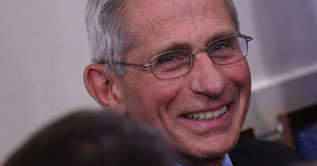 Director of the National Institute of Allergy and Infectious Diseases Anthony Fauci smiles as he listens to then-President Donald Trump speak during an unscheduled briefing after a Coronavirus Task Force meeting on April 5, 2020, in Washington, D.C.