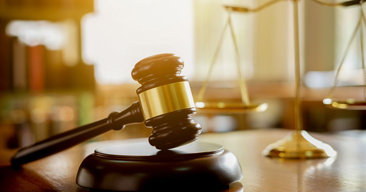 A gavel is seen in this stock image.