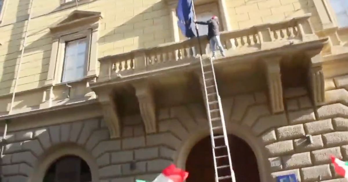 A group of protestors in Italy tore down the flag of the European Union at the E.U. headquarters in Rome.