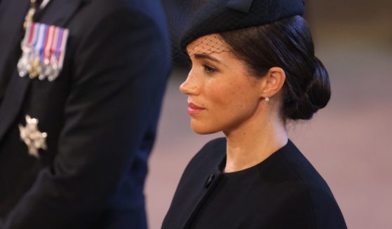 Meghan Markle looks on as the coffin of Queen Elizabeth II is brought into Westminster Hall on Wednesday in London.