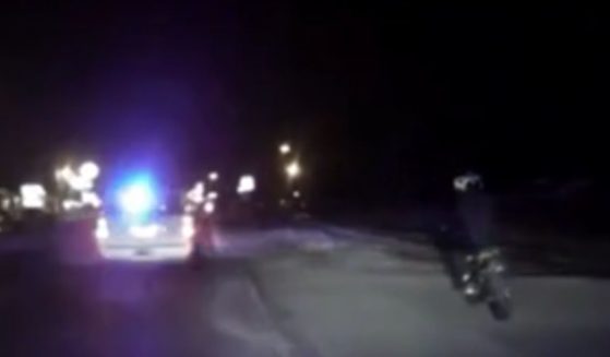A 12-year-old boy is pulled over while on his dirt bike and was allegedly kicked.