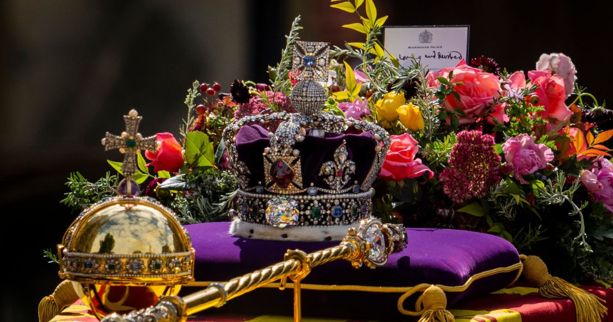 The coffin of Queen Elizabeth II leaves after the funeral service at Westminster Abbey in central London on Monday.