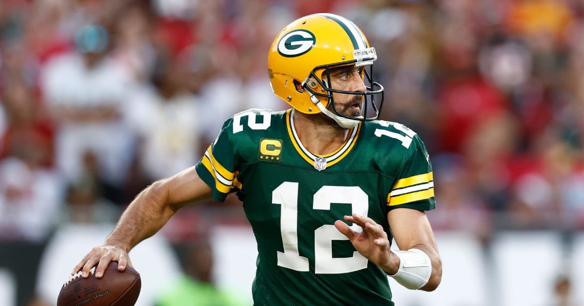 Aaron Rodgers of the Green Bay Packers looks to pass the ball against the Tampa Bay Buccaneers during the fourth quarter at Raymond James Stadium on Sunday in Tampa, Florida.