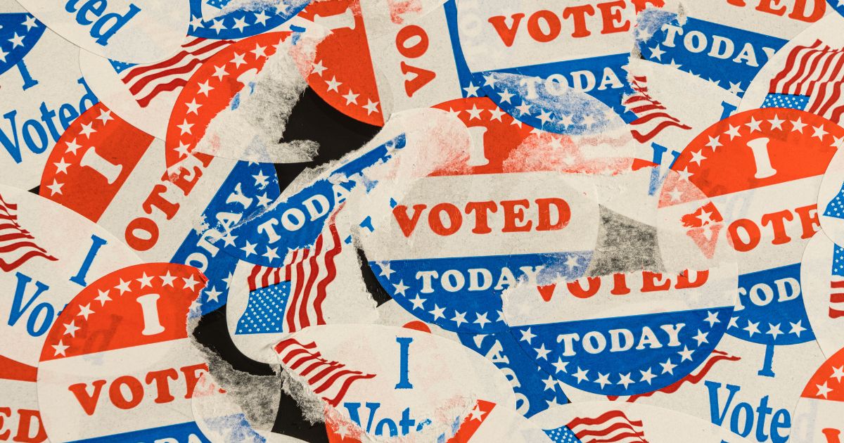 Voting stickers are seen in this stock image.
