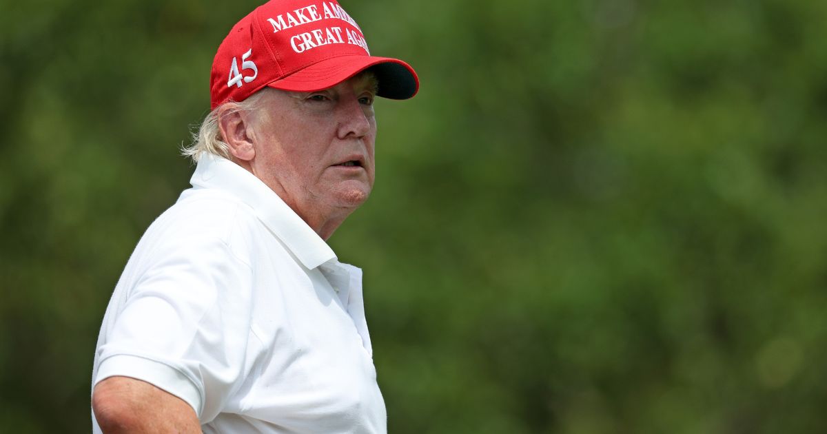 Former President Donald Trump looks on from the seventh tee during the pro-am prior to the LIV Golf Invitational - Bedminster at Trump National Golf Club Bedminster on July 28, in Bedminster, New Jersey.