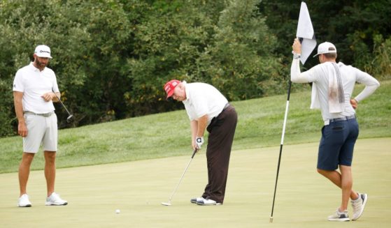 Former President Donald Trump putts on the 14th green on July 28 in Bedminster, New Jersey.