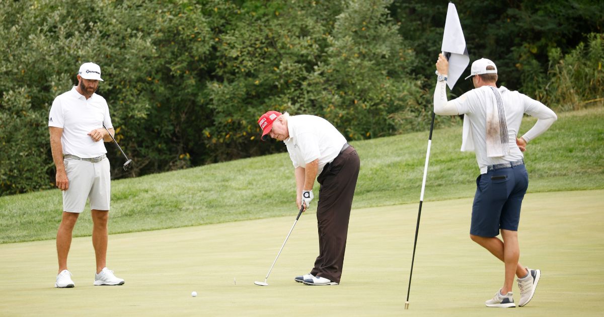 Former President Donald Trump putts on the 14th green on July 28 in Bedminster, New Jersey.