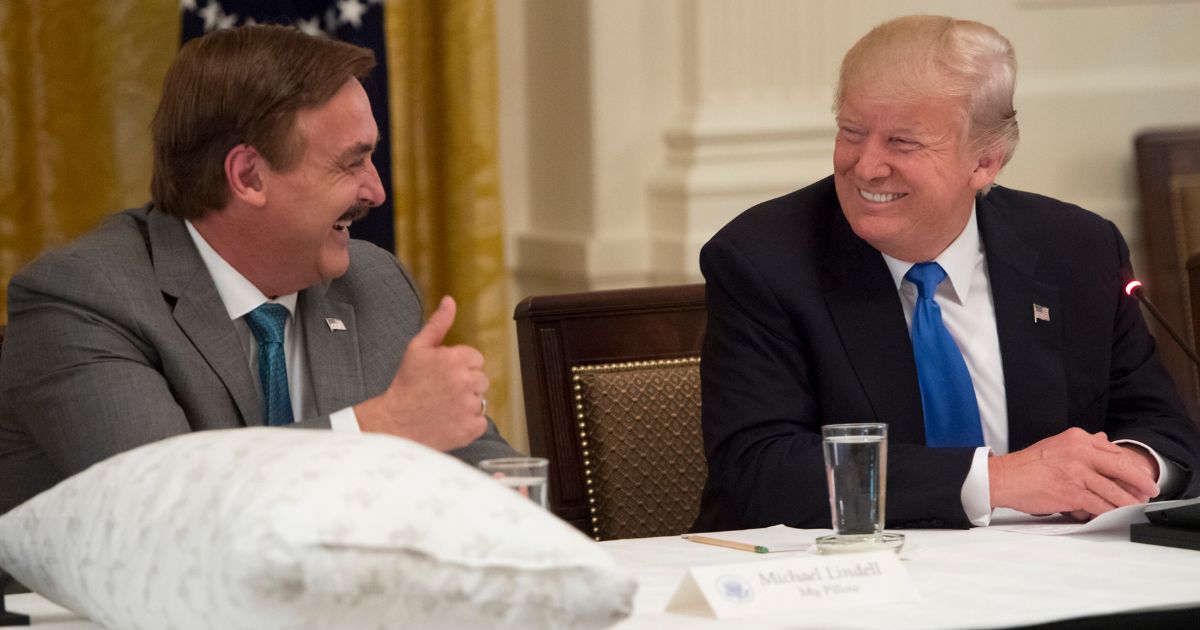 Former President Donald Trump, right, speaks alongside Mike Lindell, left, founder of My Pillow, during a Made in America event in Washington, D.C., on July 19, 2017.