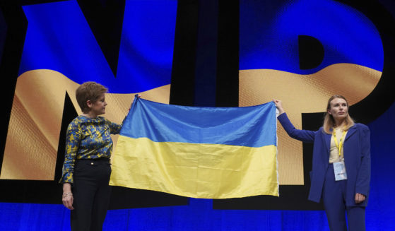 First Minister Nicola Sturgeon, left, on stage alongside Lesia Vasylenko, right, Ukrainian Member of Parliament after speaking during the SNP conference at the Event Complex Aberdeen in Aberdeen, Scotland, on Saturday.