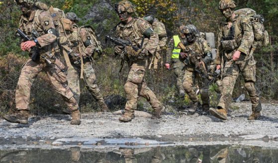 Soldiers of the 101st Airborne Division move within the circuit during the Recon Clash-22 Military Drill in Solina, Poland, on Oct. 15.