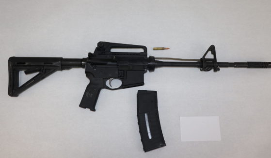 This image provided by the St. Louis Metropolitan Police Department shows an AR-15 style rifle used by the 19-year-old gunman who killed a teacher and a 15-year-old girl at a St. Louis high school on Monday.