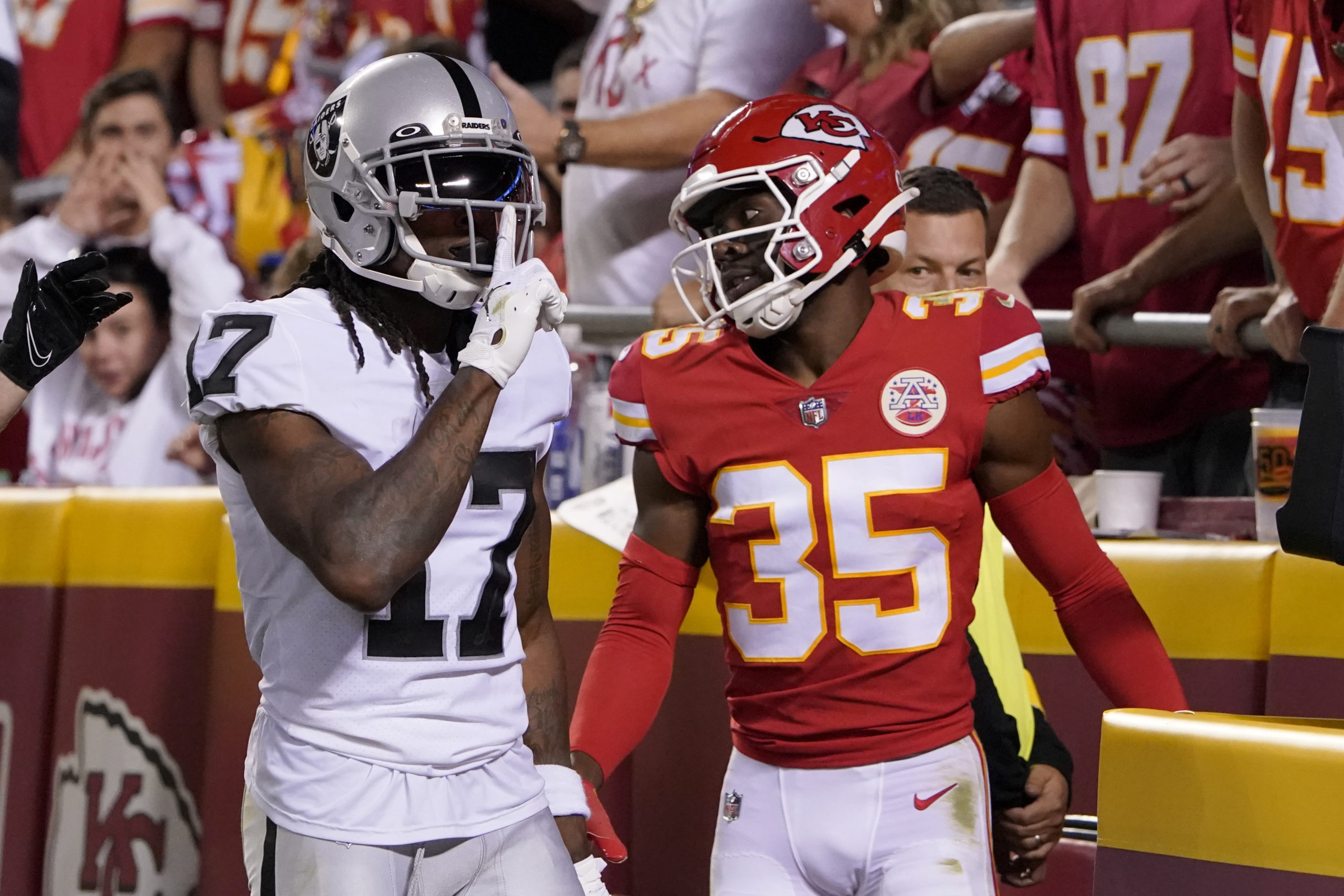 Davante Adams, left, celebrates scoring a touchdown against Jaylen Watson, right, on Monday night during the NFL Monday Night Football Game where the Las Vegas Raiders played the Kansas City Chiefs.
