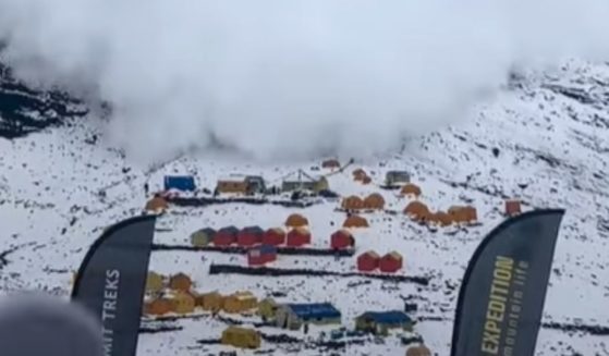 In Nepal, a massive avalanche hit a base camp at Manaslu.