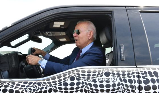 President Joe Biden sits behind the wheel of an electric Ford F-150 Lightning at the Ford Dearborn Development Center in Dearborn, Michigan, on May 18, 2021.