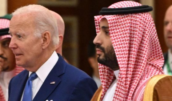 President Joe Biden, left, arrives with Saudi Crown Prince Mohammed bin Salman, right, to take a photo during the Jeddah Security and Development Summit in Jeddah, Saudi Arabia, on July 16.