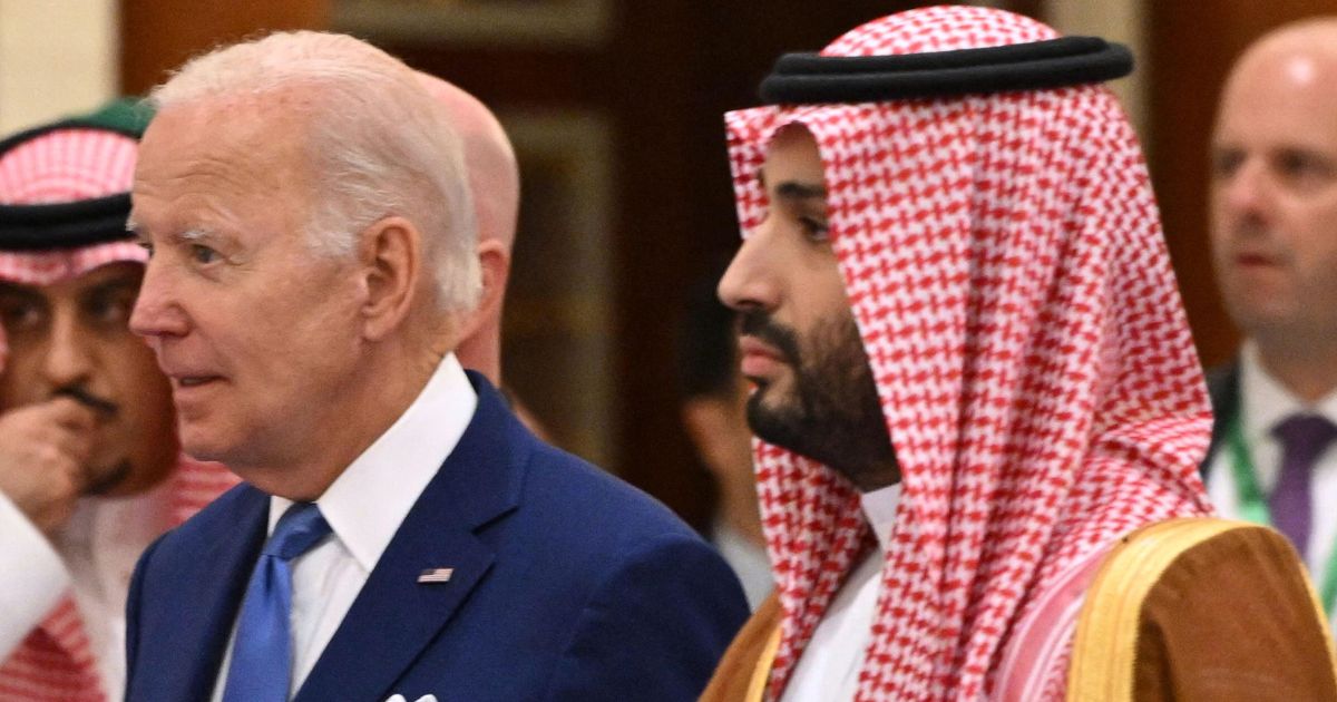 President Joe Biden, left, arrives with Saudi Crown Prince Mohammed bin Salman, right, to take a photo during the Jeddah Security and Development Summit in Jeddah, Saudi Arabia, on July 16.