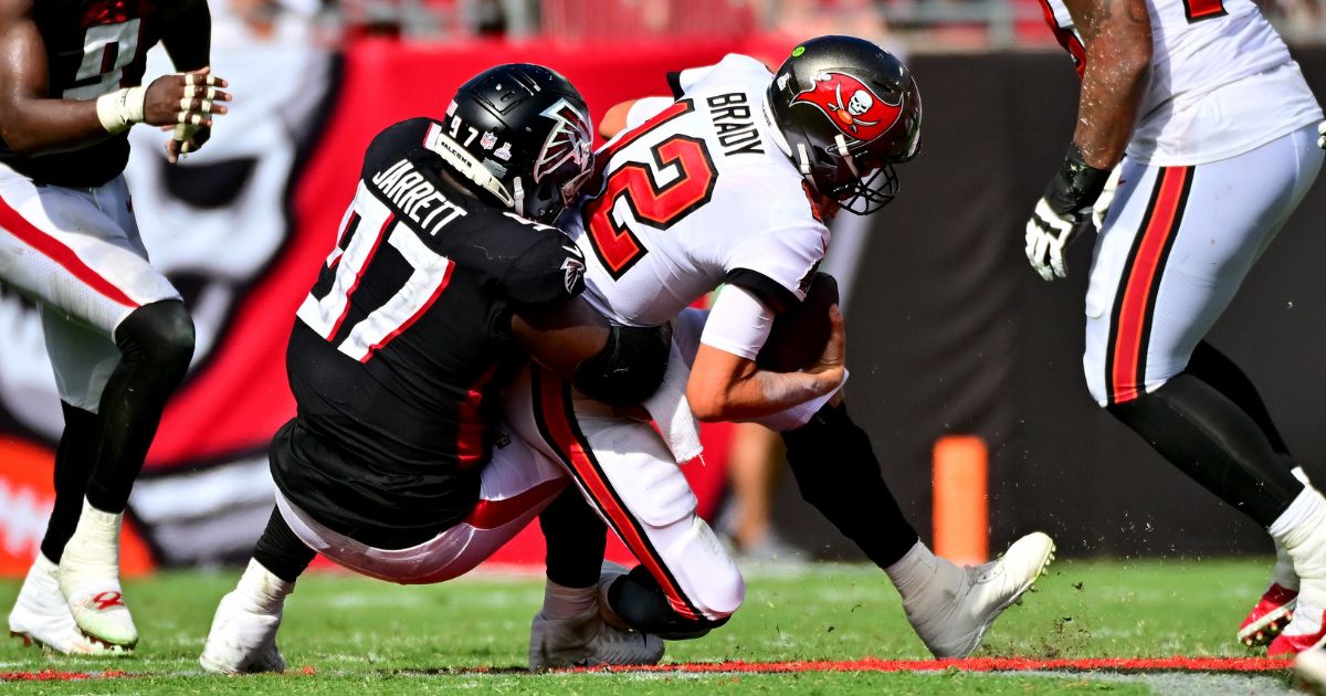 Grady Jarrett of the Atlanta Falcons sacks Tom Brady of the Tampa Bay Buccaneers during the fourth quarter of the game at Raymond James Stadium on Sunday.