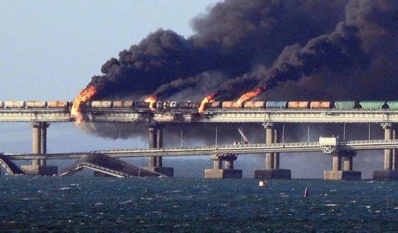 Black smoke billows from a fire on the Kerch Bridge that links Crimea to Russia after an explosion Oct. 8 that killed at least four people.